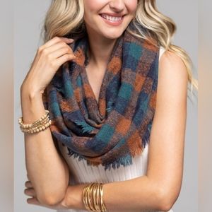 PLaid infinity scarf with frayed edges
